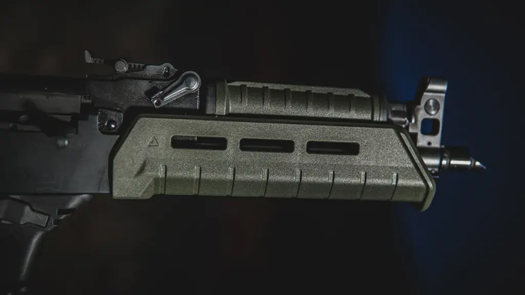 OD green polymer M-LOK handguard mounted on an AK-pattern rifle