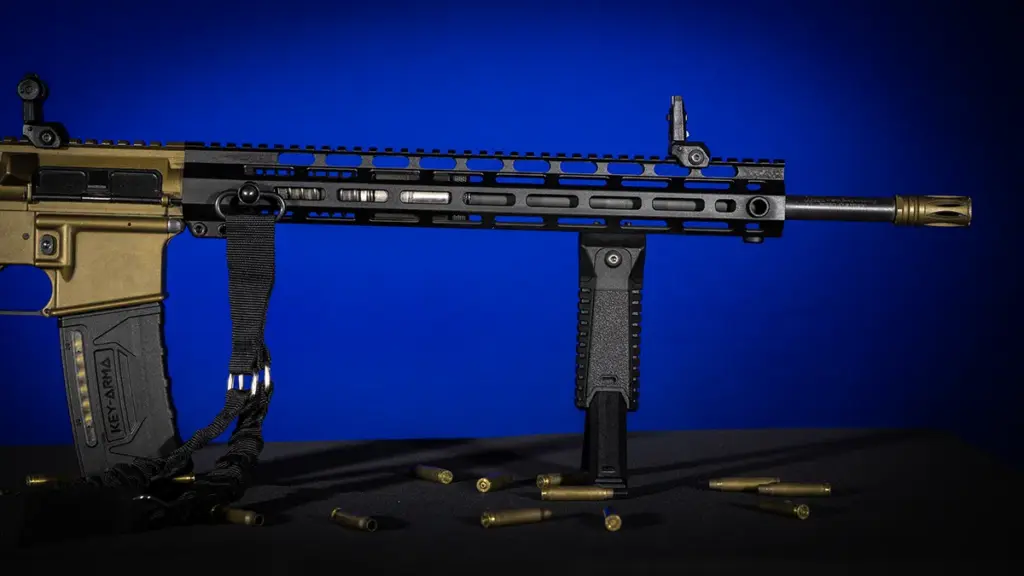AR-15 with a full-length M-LOK handguard, sling mount and muzzle device