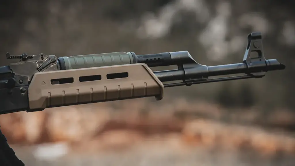 FDE M-LOK handguard covering the gas tube on an AK rifle